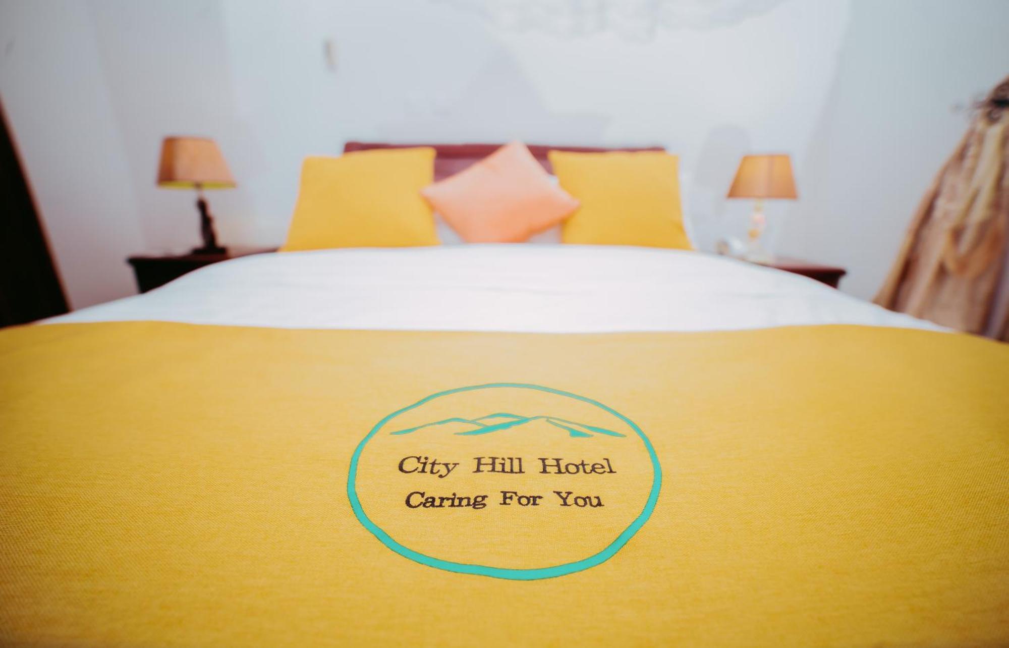 City Hill Hotel บุจัมบุรา ภายนอก รูปภาพ